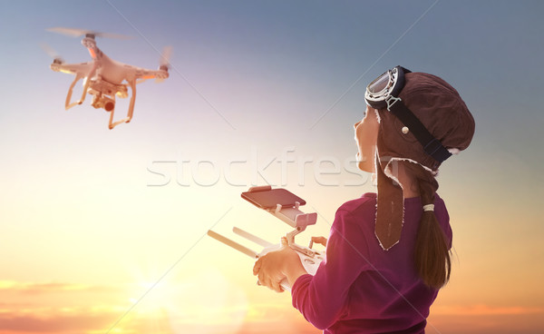 Kid is playing with drone Stock photo © choreograph