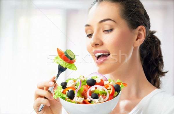Egészségesen enni étel gyönyörű lány nő száj portré Stock fotó © choreograph