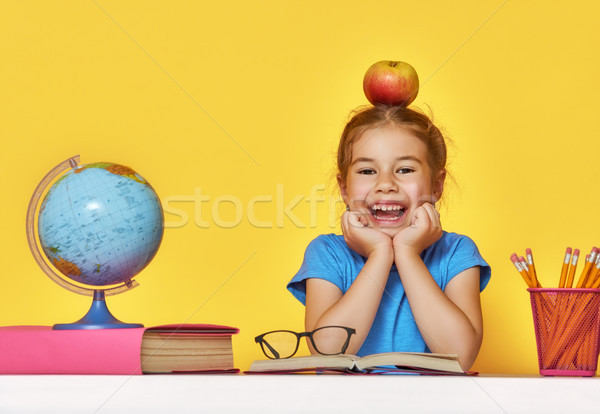 Stock photo: Kid is learning in class