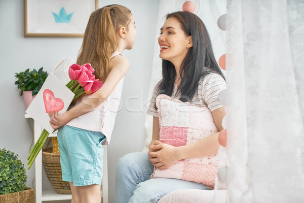 daughter is congratulating mom Stock photo © choreograph