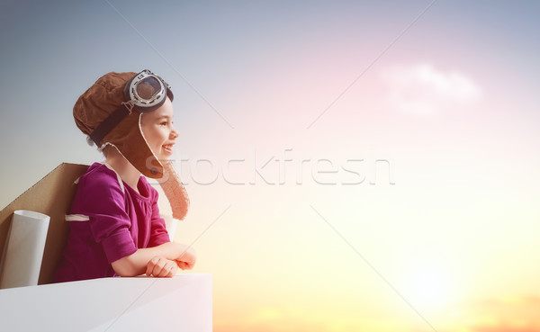 Kız astronot küçük çocuk gün batımı gökyüzü Stok fotoğraf © choreograph