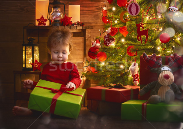 baby girl with Christmas present Stock photo © choreograph