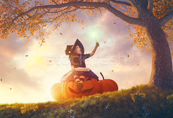 witch with a big pumpkin Stock photo © choreograph