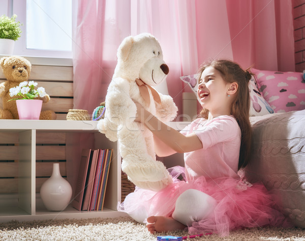 girl plays with teddy bear Stock photo © choreograph