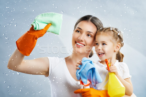 Gospodyni domowa szczęśliwą rodzinę domu uśmiech pracy dziecko Zdjęcia stock © choreograph