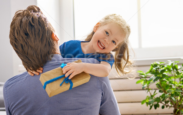 daughter congratulating dad Stock photo © choreograph
