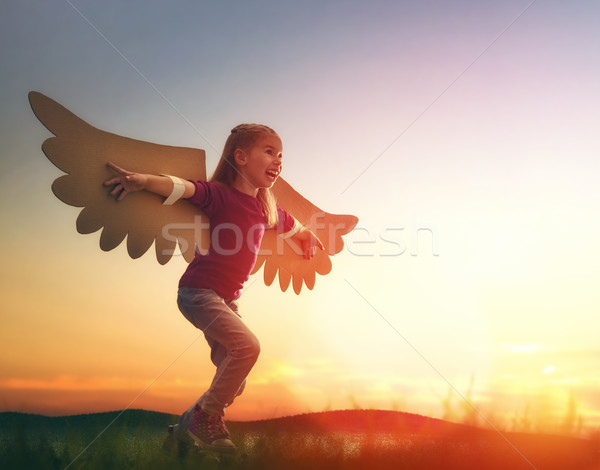 Kid with the wings of a bird Stock photo © choreograph