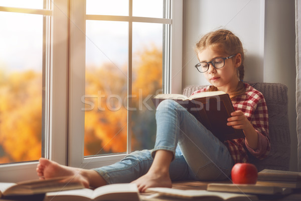 girl reading a book Stock photo © choreograph