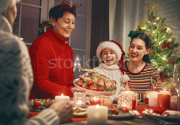 Family celebrates Christmas. Stock photo © choreograph