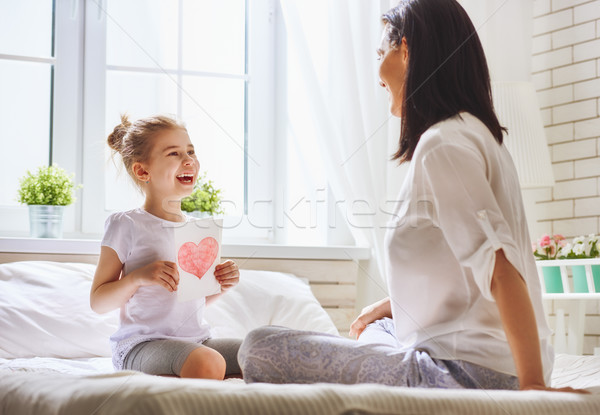 daughter congratulates mom Stock photo © choreograph