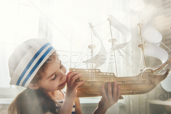 girl making model ship Stock photo © choreograph