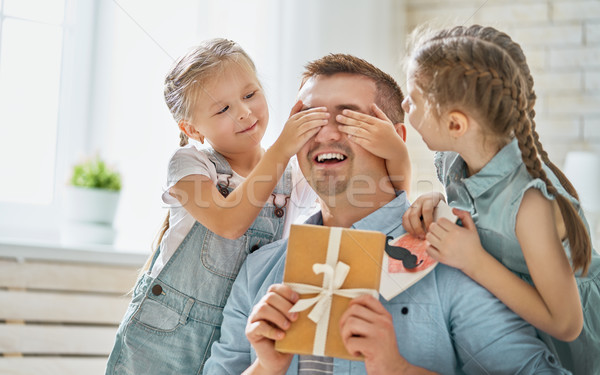 daughters congratulating dad Stock photo © choreograph