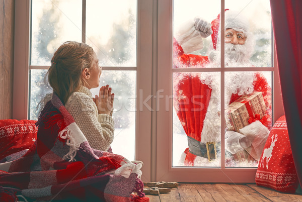 girl by window at Christmas Stock photo © choreograph