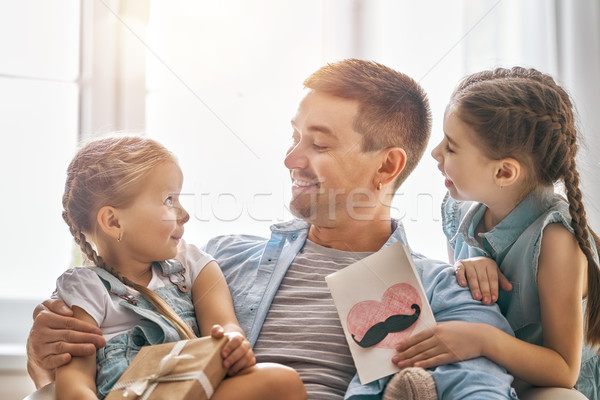 daughters congratulating dad Stock photo © choreograph