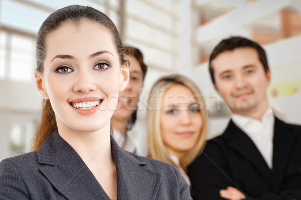 Oameni de afaceri echipă de succes zâmbitor tineri birou Imagine de stoc © choreograph