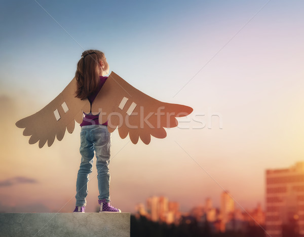 Kid with the wings of a bird Stock photo © choreograph