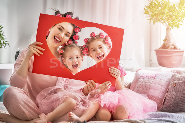 Mom and children doing hair Stock photo © choreograph