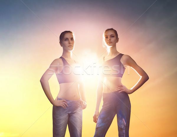 [[stock_photo]]: Deux · sport · filles · coucher · du · soleil · sport