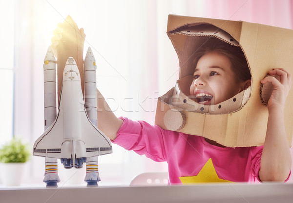 girl in an astronaut costume Stock photo © choreograph