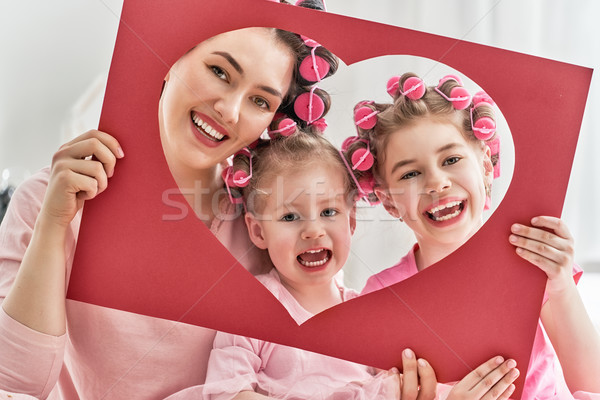 Mom and children doing hair Stock photo © choreograph