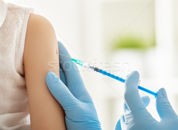 Stock photo: a vaccination to a child