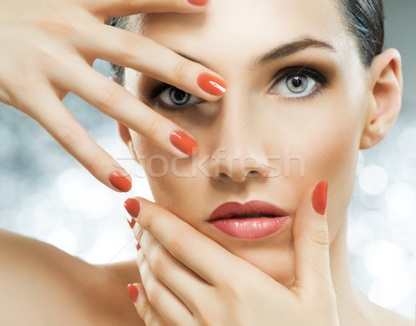 Coloré manucure belle fille ongles rouges mains visage [[stock_photo]] © choreograph