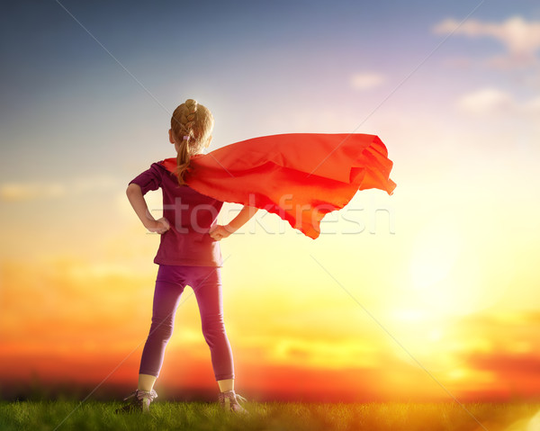 Fată superhero copil apus cer Imagine de stoc © choreograph