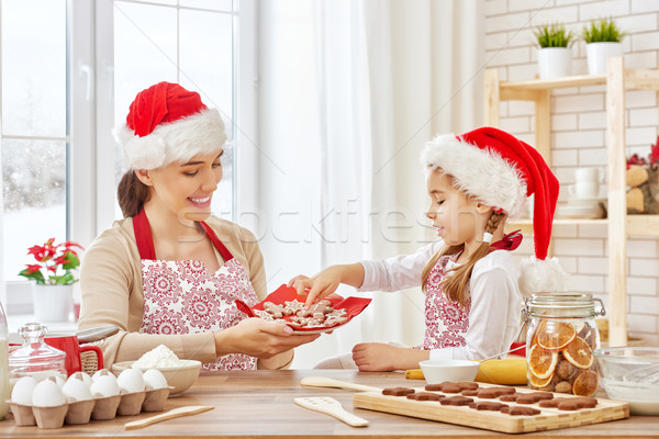 Gotowania christmas herbatniki matka córka kobieta Zdjęcia stock © choreograph