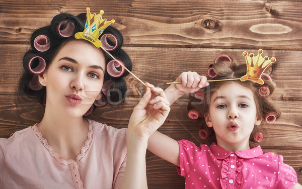 Stock photo: Funny family with a paper accessories