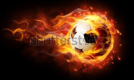 Calcio palla simbolo luminoso nero fuoco Foto d'archivio © choreograph