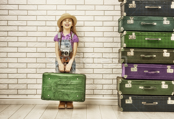 girl holding a suitcase Stock photo © choreograph