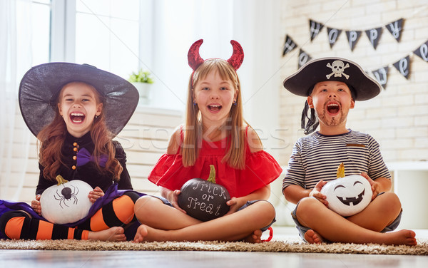 children play with pumpkins Stock photo © choreograph