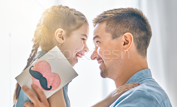 daughter congratulates dad Stock photo © choreograph