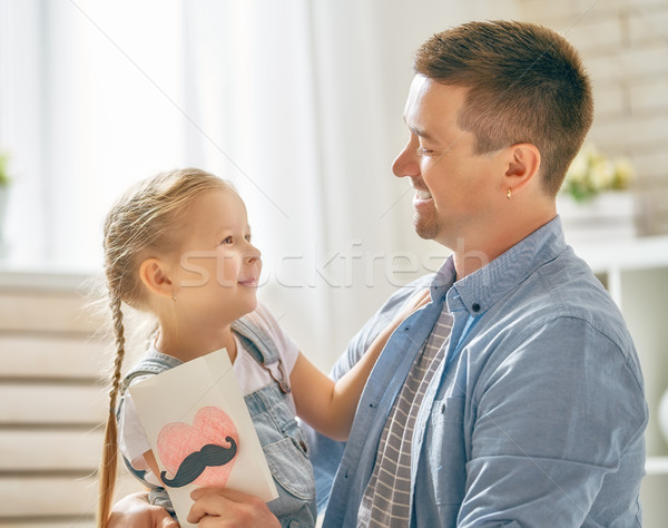 daughter congratulating dad Stock photo © choreograph