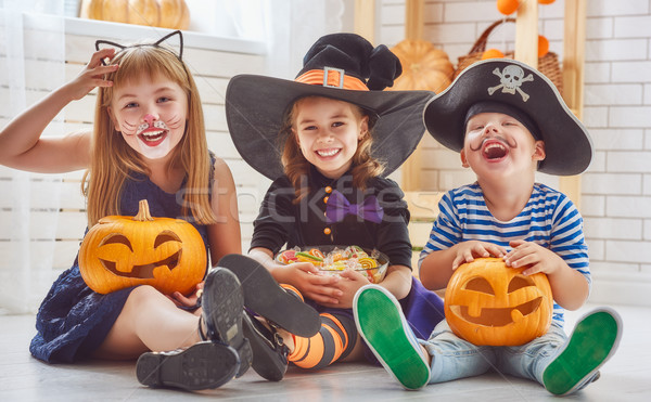 children play with pumpkins Stock photo © choreograph