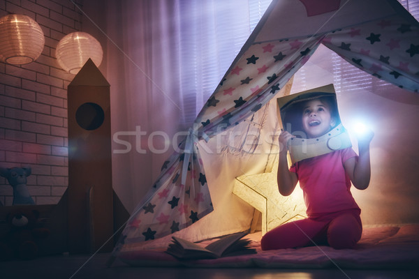 girl in an astronaut costume Stock photo © choreograph