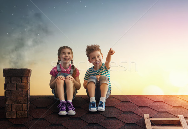 Boy and girl make a wish Stock photo © choreograph