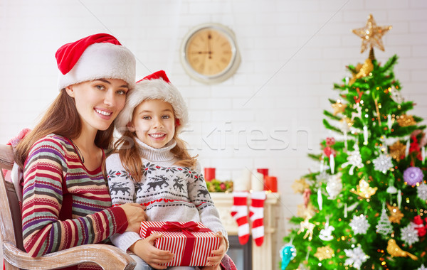 Christmas viering kind moeder vergadering kerstboom Stockfoto © choreograph