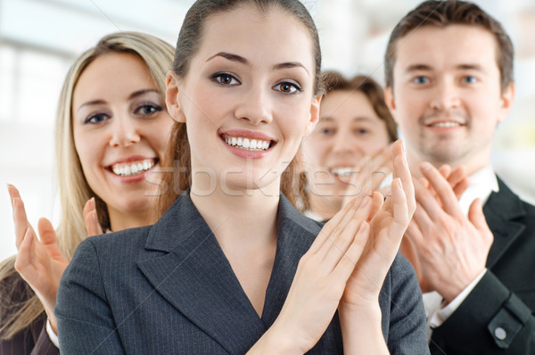 Zakenlieden team geslaagd glimlachend jonge kantoor Stockfoto © choreograph