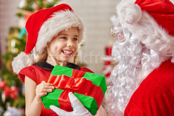 Stockfoto: Kerstman · aanwezig · weinig · cute · meisje · huis