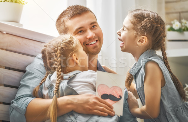 daughters congratulating dad Stock photo © choreograph