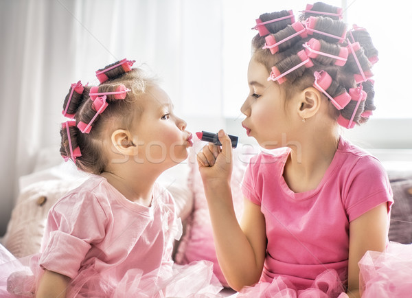 sisters are doing hair and having fun Stock photo © choreograph