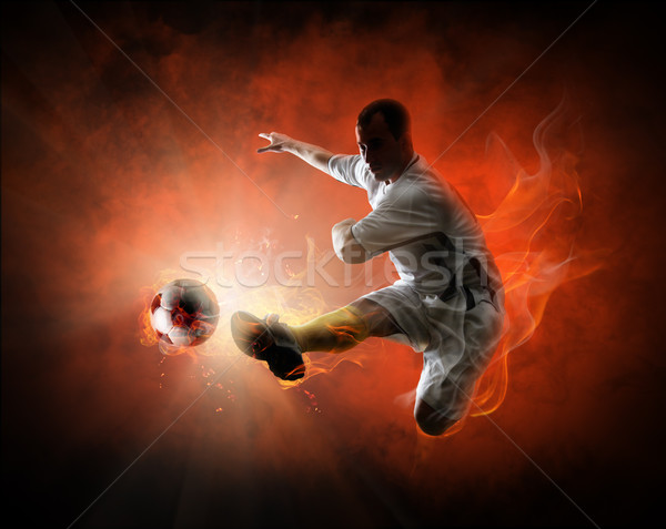 Voetballer bal voetbal mannen energie Stockfoto © choreograph