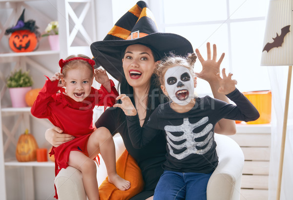 family celebrating Halloween Stock photo © choreograph