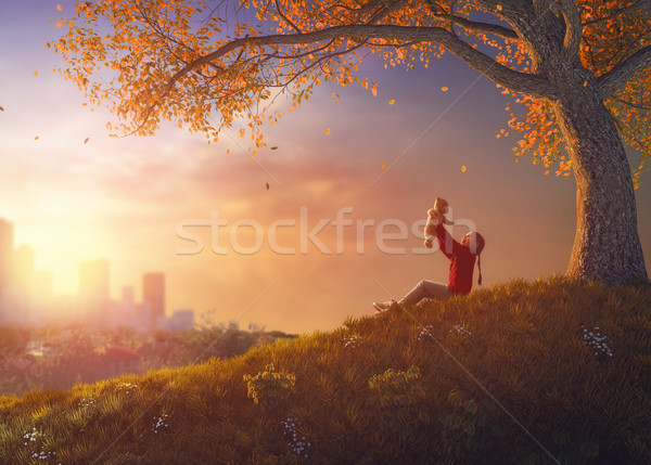 girl walking in autumn park Stock photo © choreograph