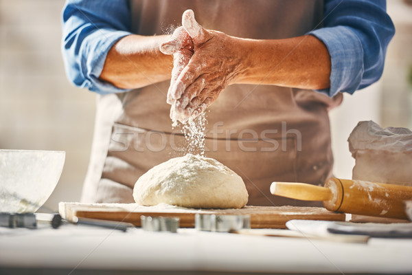 Hands preparing dough Stock photo © choreograph