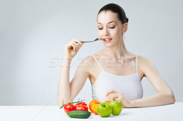 Egészségesen enni étel gyönyörű karcsú lány mosoly Stock fotó © choreograph