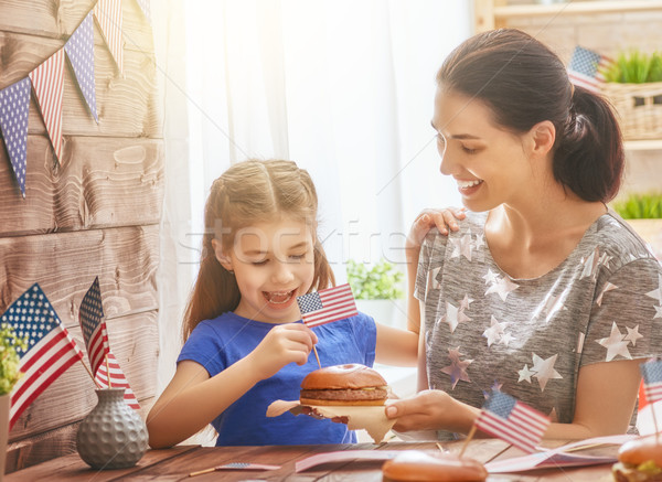 Patriotic holiday. Happy family Stock photo © choreograph