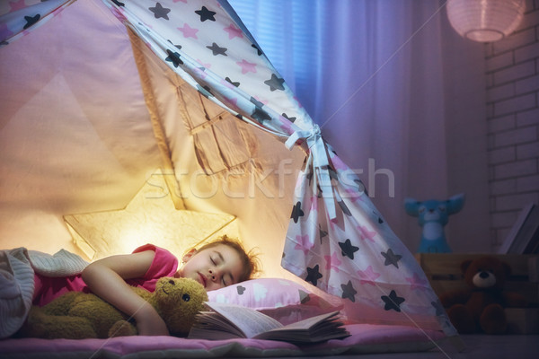 girl is napping in the tent Stock photo © choreograph