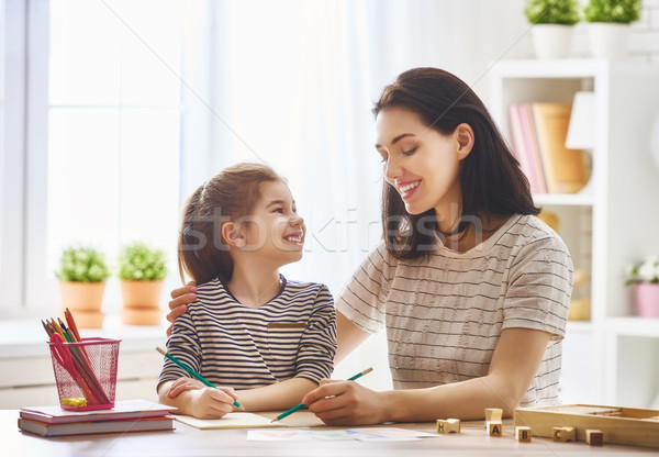 woman teaches child the alphabet Stock photo © choreograph